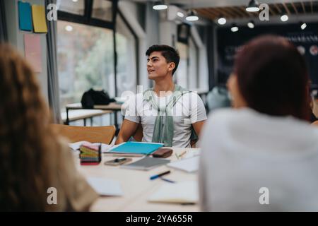 Young student engaging in a collaborative classroom discussion session Stock Photo