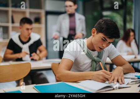 Focused students participating in a classroom environment Stock Photo