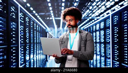 Server Room In Data Center. Cloud Computer Engineer Configuring AI Technology Stock Photo