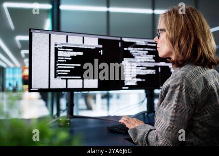 Web Developer Coding On Computer To Develop Code Stock Photo