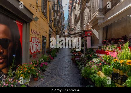 Naples, Italy - May 23, 2024: A Picturesque Flower Vendor Scene in the Streets of Naples. Stock Photo