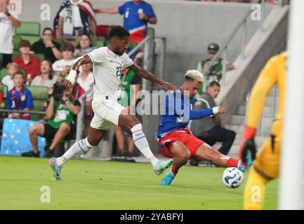 ANTONEE RXOBINSON (5) of the USA takes a shot on goal defended by MICHAEL MURILLO (23) of Panama during the first half of an international friendly between the United States Men's National team (USMNT) and Panama in the Hispanic Heritage Match at Austin's Q2 Stadium on October 12, 2024. This is the U.S. squad's first match under the direction of new head coach Mauricio Pochettino who came from the English Premier League. Credit: Bob Daemmrich/Alamy Live News Stock Photo