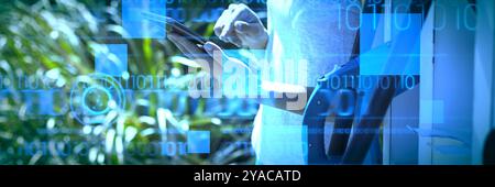 interface against woman using digital tablet at charging station Stock Photo