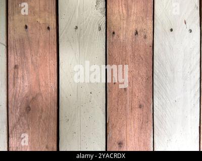 old wooden fence with weathered paint Stock Photo