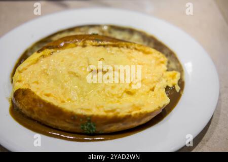 omu rice, omelette with rice with curry sauce. japanese food Stock Photo