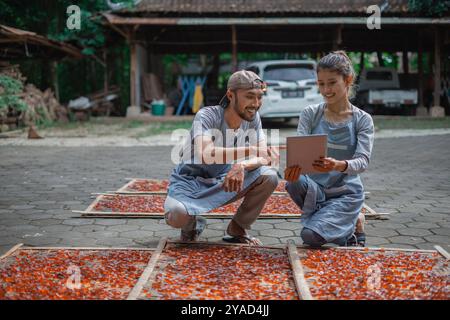 Collaborative Harvesting Young Adults Actively Engaged in Food Innovation and More Stock Photo