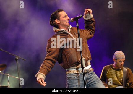 Milan Italy 09/11/2004: Kekko alias Francesco Silvestre, singer of Modà, Italian Pop Rock group, during the live concert of Radio Italia 'Oltre ogni Muro' Stock Photo