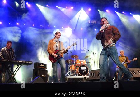 Milan Italy 09/11/2004: Kekko alias Francesco Silvestre, singer of Modà, Italian Pop Rock group, during the live concert of Radio Italia 'Oltre ogni Muro' Stock Photo