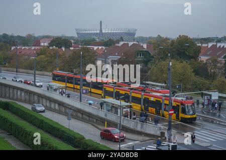 Warsaw, Poland . 13 October   2024  A view overlooking commuter trams and  PGE Narodowy Stadium built for the 2012 European championships  under dark clouds on a rainy day in Warsaw  - Credit.Amer Ghazzal/Ģ����ý Live News Stock Photo