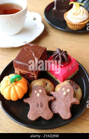 Delectable and Playful Assorted Pastries for Halloween Tea Party Stock Photo