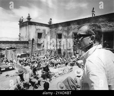 SAM PECKINPAH and WILLIAM HOLDEN on the set of THE WILD BUNCH 1969