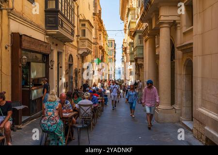 VALLETTA, MALTA - AUGUST 30 2024: People enjoy summer vacation in Valletta. Stock Photo