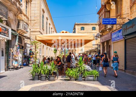 VALLETTA, MALTA - AUGUST 30 2024: People enjoy summer vacation in Valletta Stock Photo