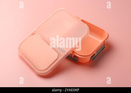 Empty plastic lunch box on pink background Stock Photo