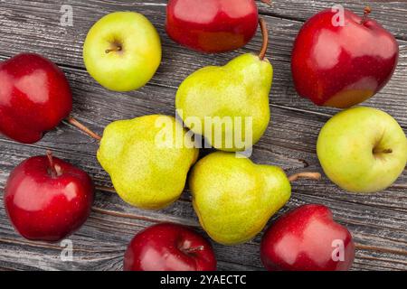 pears apples on wood background top view Stock Photo