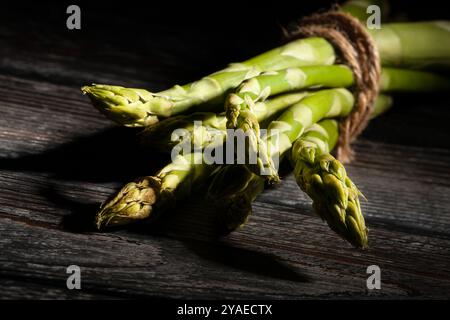 asparagus on black wood background Stock Photo