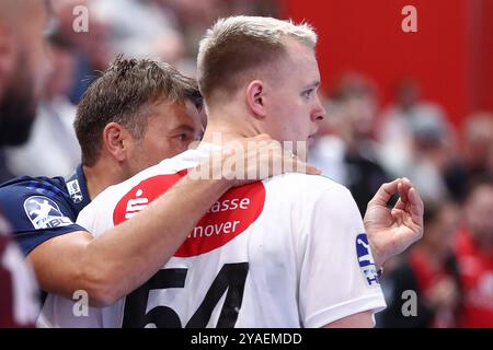 13.10.2024, xtgx, Handball, Daikin HBL, 1. VfL Potsdam - TSV Hannover Burgdorf v.l. Christian Prokop Hannover, Trainer, Justus Fischer Hannover, 54 Potsdam *** 13 10 2024, xtgx, Handball, Daikin HBL, 1 VfL Potsdam TSV Hannover Burgdorf v l Christian Prokop Hannover, Coach , Justus Fischer Hannover, 54 Potsdam Stock Photo