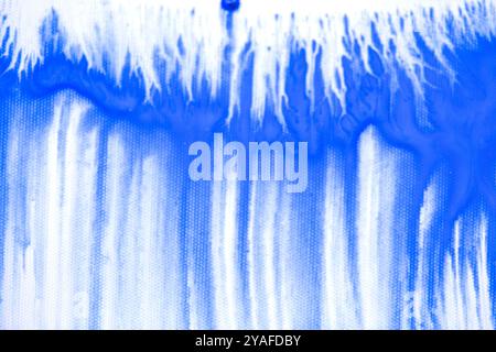 Blue watercolor paint on white paper Stock Photo