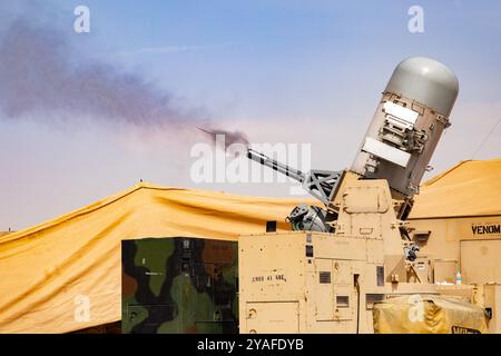 U.S. Army Soldiers from Alpha Battery, 1st Battalion, 118th Field Artillery Regiment, assigned to Combined Joint Task Force - Operation Inherent Resolve, perform a pre-aim calibration fire (PACFIRE) on a Counter Rocket, Artillery and Mortar (C-RAM) air defense system in Northern Iraq, Sept. 22, 2024. Defensive systems like the C-RAM are used to ensure the safety of U.S. and Coalition forces. (U.S. Army photo by Staff Sgt. Bruce Daddis) Stock Photo