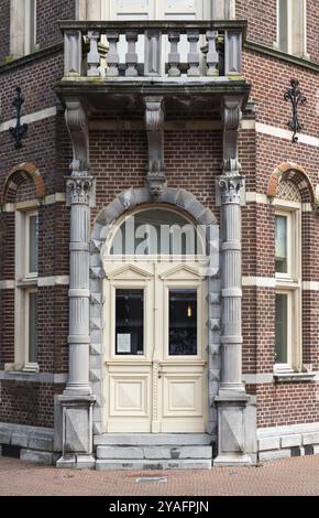 Echt, Limburg, The Netherlands, 04 07 2022, Corner building with vintage wooden door, Europe Stock Photo