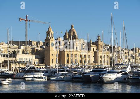 Valletta, Malta, 01 06 2022: Panoramic view over the harbor and coastal line with blue water and sky, Europe Stock Photo