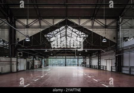 Brussels, Belgium, 05 23 2018: Industrial garage hall of the Kanal Centre Pompidou, now a museum, Europe Stock Photo