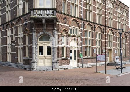 Echt, Limburg, The Netherlands, 04 07 2022, Corner building with vintage wooden door, Europe Stock Photo