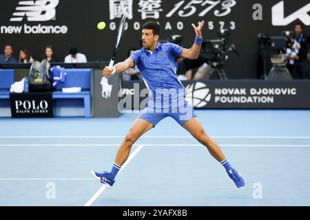 MELBOURNE, AUSTRALIA, JANUARY 11: Novak Djokovic of Serbia plays Stefanos Tsitsipas of Greece during a charity match ahead of the 2024 Australian Open Stock Photo