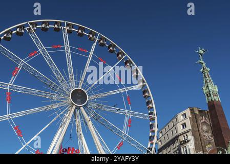 Russels Old Town, Brussels Capital Region, Belgium, 12 06 2019 The ferris Wheel at the Christmas market at Place Sainte Catherine, Europe Stock Photo