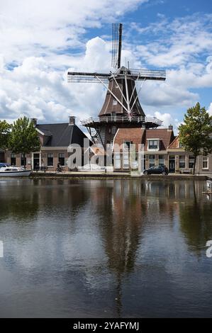 Meppel, Overijssel, The Netherlands, 20 07 2022, Windmill reflecting in the wate rpond of the village, Europe Stock Photo