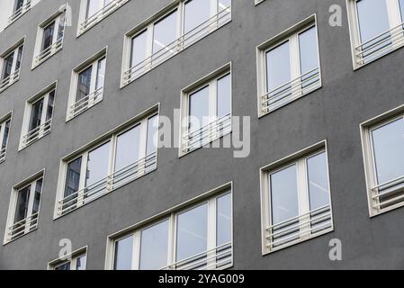 Brussels Industrial zone, Brussels Capital Region, Belgium, 11 04 2019 Abstract view over the grey rectangular windows of a contemporary building, Eur Stock Photo