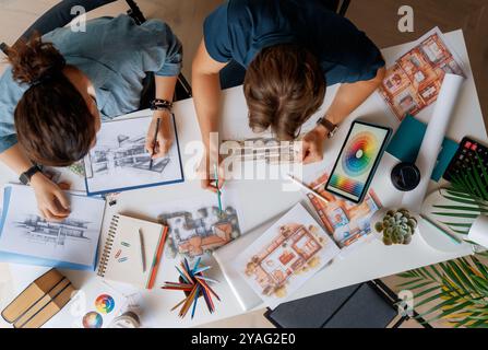 Designers working in studio and using sketches. Stock Photo