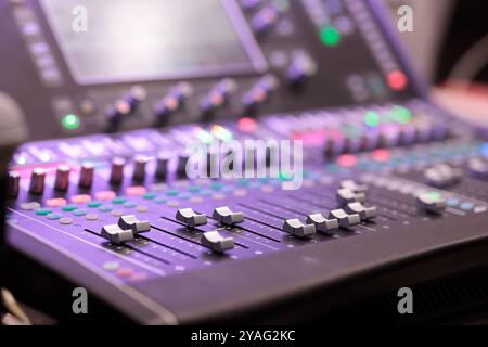Modern professional sound mixing console close up. Selective focus. Stock Photo