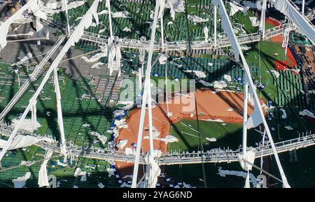 St. Petersburg, United States. 13th Oct, 2024. (EDITORS NOTE: Image taken with drone) In this aerial view, the domed roof at Tropicana Field, the home of the Tampa Bay Rays, is seen ripped to shreds from Hurricane Miltonís powerful winds in St. Petersburg. The storm passed through the area on October 10, 2024, making landfall as a Category 3 hurricane in Siesta Key, Florida. Credit: SOPA Images Limited/Alamy Live News Stock Photo