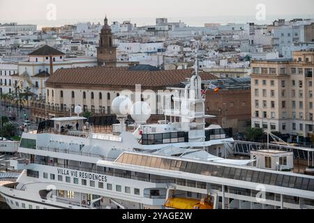 Cadiz, Spain. 14th Oct, 2024. The cruise ship Odyssey, after being stranded in Belfast Lough, Northern Ireland for months has now arrived in Cadiz, Spain this morning as part of it's three year trip. Formerly known as the Crown Dynasty, this ship was purchased by Villa Vie Residences in 2023. The ship was built in 1993 in Valencia, Spain, and has been owned by several cruise companies. In 2024, the ship was refurbished in Belfast, Northern Ireland, and renamed the Villa Vie Odyssey. Credit: Mick Flynn/Alamy Live News Stock Photo