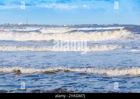 breaking waves on cambois beach near blyth northumberland Stock Photo