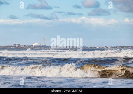 breaking waves on cambois beach near blyth northumberland Stock Photo