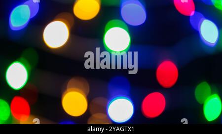 Vibrant Defocused Bokeh Lights, Abstract Festive Background in Vivid Colors Stock Photo