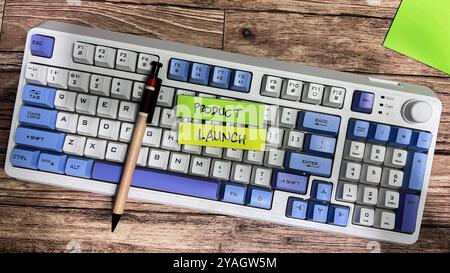 Concept of Product Launch write on sticky notes isolated on Wooden Table. Stock Photo