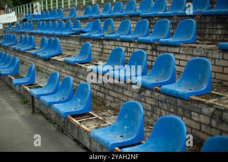 Sports stand. Empty seats in the stadium. Chairs in the stadium. Stock Photo