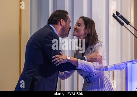 Madrid, Spain. 14th Oct, 2024. Reyes Maroto (R), member of the 10th legislature of the Assembly of Madrid and the Minister of Transport of the Government of Spain, Oscar Puente (L), greet each other during an informative breakfast in Madrid. Reyes Maroto, member of the 10th legislature of the Madrid Assembly, and the Minister of Transport, Oscar Puente, participated in an informative breakfast organized by Nueva Economia Forum in a hotel in the center of Madrid. Credit: SOPA Images Limited/Alamy Live News Stock Photo