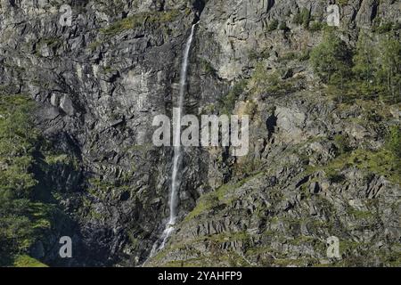 7th September, 2024 Flam & Bergen, Norway  One of many tall waterfalls tipping into the Aurlandsfjord. Stock Photo