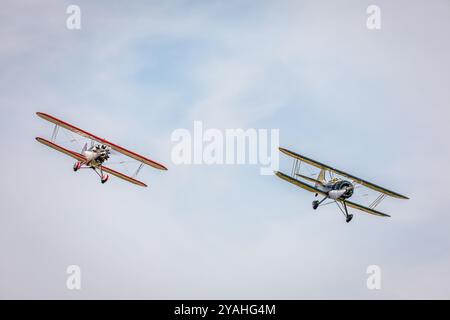 Curtiss-Wright Travel Air 4000 'NC 8115' and Waco UPF-7 'G-UPFS', Old Warden Airfield, Biggleswade, Bedfordshire, England, UK Stock Photo