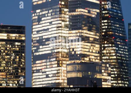 Abstract of illuminated office windows in London financial district Stock Photo