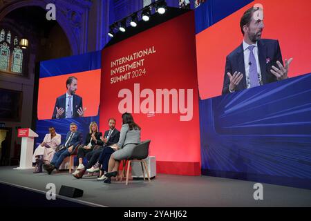 (left to right) Actress, writer, director and producer Adjoa Andoh, Sir Lucian Grainge, chairman and CEO of Universal Music Group, Dr Anna Mallett, vice president (production) at Netflix, former head coach of the England men's football team Gareth Southgate, Maria Balshaw, director of the Tate (obscured) and Culture Secretary Lisa Nandy, taking part in the 'UK's creative assets: Soft power as a hard investment opportunity' discussion during the International Investment Summit in London, as the Government seeks to woo investors to the UK. Picture date: Monday October 14, 2024. Stock Photo