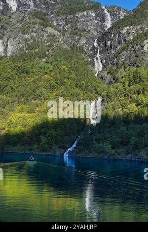 7th September, 2024 Flam & Bergen, Norway  One of many tall waterfalls tipping into the Aurlandsfjord. Stock Photo