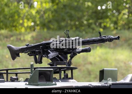 MG4 machine gun on the roof of a tank. Military Equipment Exhibition. Stock Photo