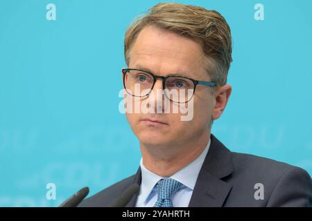 GER, Berlin, Pressekonferenz - Statements nach Bundesvorstandssitzung, mit dem Generalsekretaer der CDU Deutschlands Dr. Carsten Linnemann MdB und dem Mitgliederbeauftragten der CDU Deutschlands Philipp Amthor MdB im Bild v.l.: Dr. Carsten Linnemann, CDU Deutschlands Klingelhoeferstraße 8 10785 Berlin, 14.10. 2024, *** GER, Berlin, Press conference statements after Federal Executive Committee meeting, with the Secretary General of the CDU Germany Dr Carsten Linnemann MdB and the Membership Representative of the CDU Germany Philipp Amthor MdB in the picture from l Dr Carsten Linnemann, CDU Germ Stock Photo