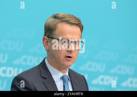 GER, Berlin, Pressekonferenz - Statements nach Bundesvorstandssitzung, mit dem Generalsekretaer der CDU Deutschlands Dr. Carsten Linnemann MdB und dem Mitgliederbeauftragten der CDU Deutschlands Philipp Amthor MdB im Bild v.l.: Dr. Carsten Linnemann, CDU Deutschlands Klingelhoeferstraße 8 10785 Berlin, 14.10. 2024, *** GER, Berlin, Press conference statements after Federal Executive Committee meeting, with the Secretary General of the CDU Germany Dr Carsten Linnemann MdB and the Membership Representative of the CDU Germany Philipp Amthor MdB in the picture from l Dr Carsten Linnemann, CDU Germ Stock Photo