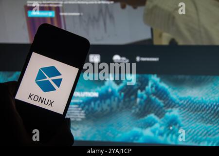 Rheinbach, Germany  13 October 2024,  The brand logo of the German AI company "Konux" on the display of a smartphone in front of the website Stock Photo